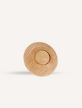 A round Wooden Fidget from Sensory Play Australia, featuring a concave center for sensory and tactile input.