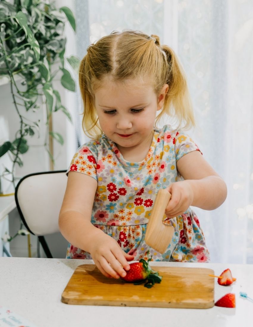 The Play Way's Sensory Friendly Food Handling Kit: Wooden wavy cutter and metal food comb, aiding fine motor skill development and food handling.
