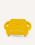 Angled view of yellow The Play Way scooter board, a therapist-designed tool for enhancing physical and cognitive development.