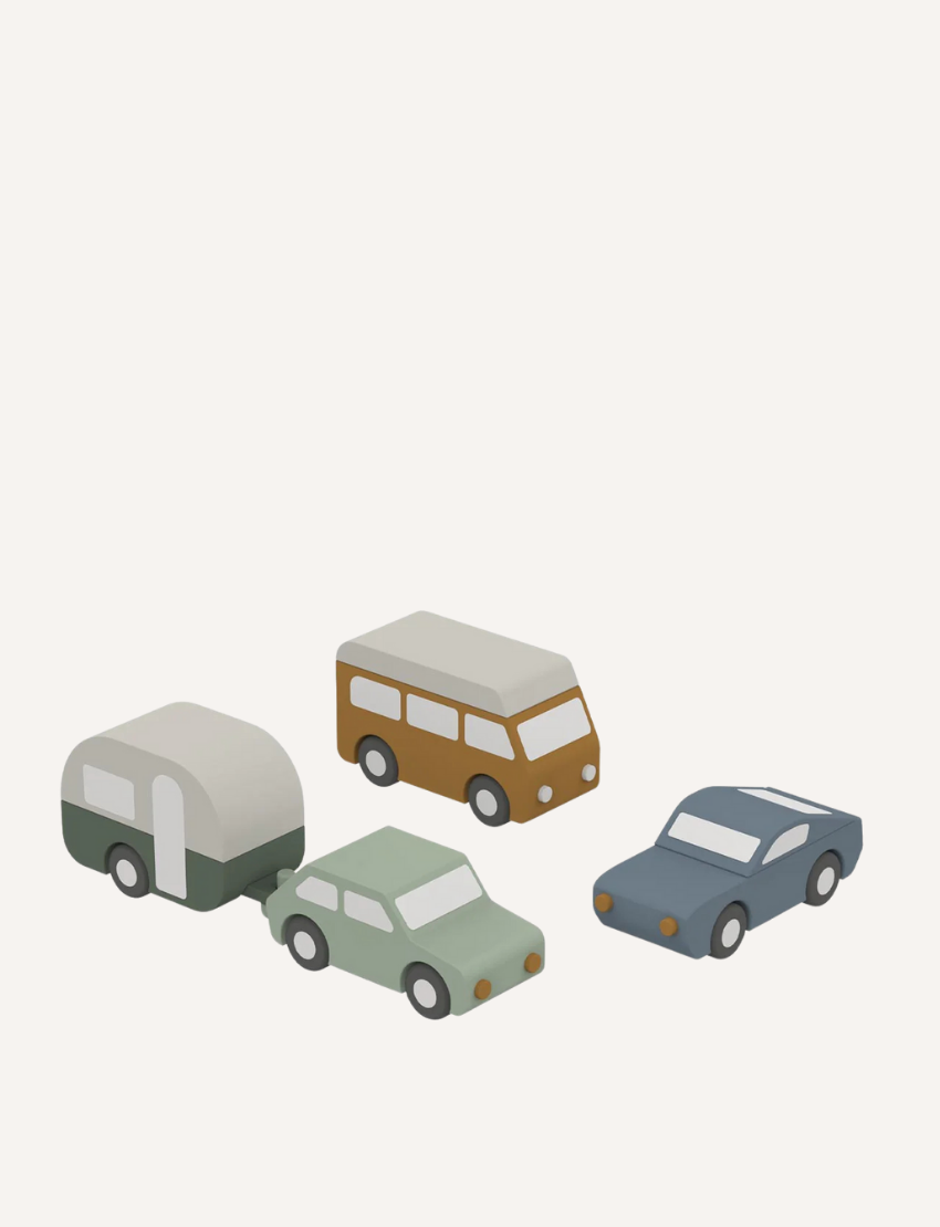 Set of four wooden toy vehicles: camper van, car, and two other cars, on a white background.