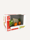 Hape Walk-A-Long Crocodile toy presented in its branded packaging, highlighting its play and learn features.