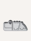 Grey silicone plate shaped like a crocodile with three divided sections and black line drawings of features.