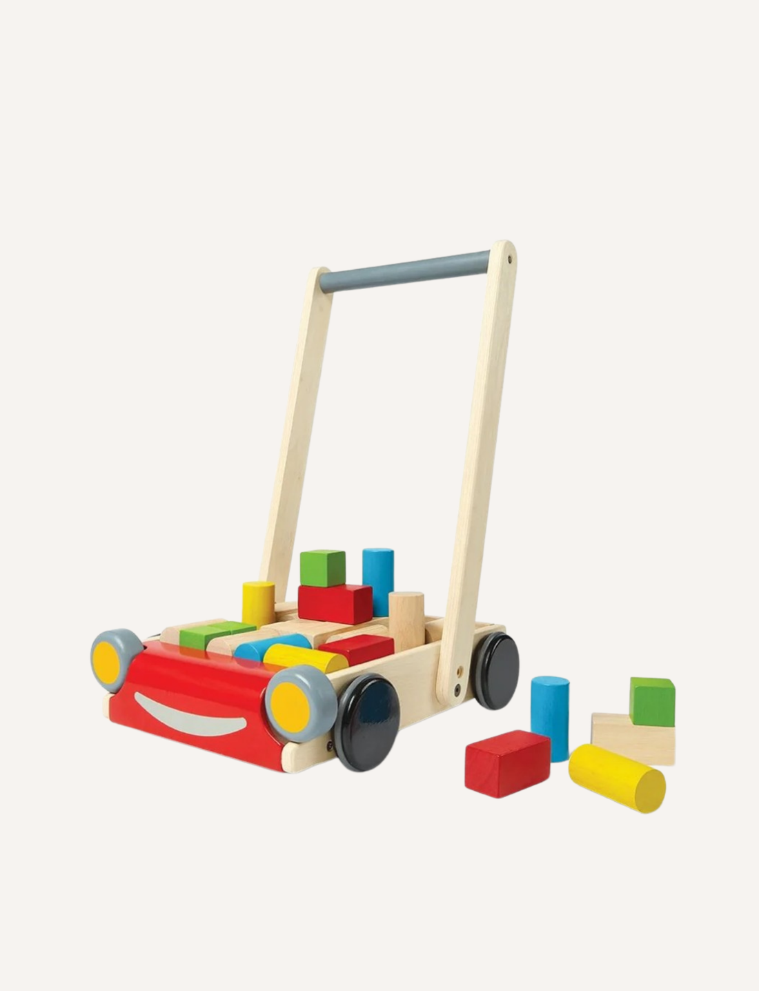 Wooden baby walker designed as a red car, filled with colorful building blocks, on a light background.
