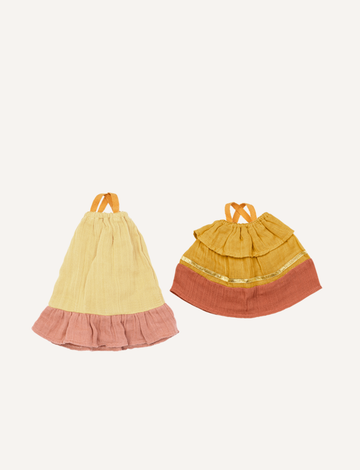 Two doll summer dresses, one yellow and pink, the other mustard and rust with gold trim.
