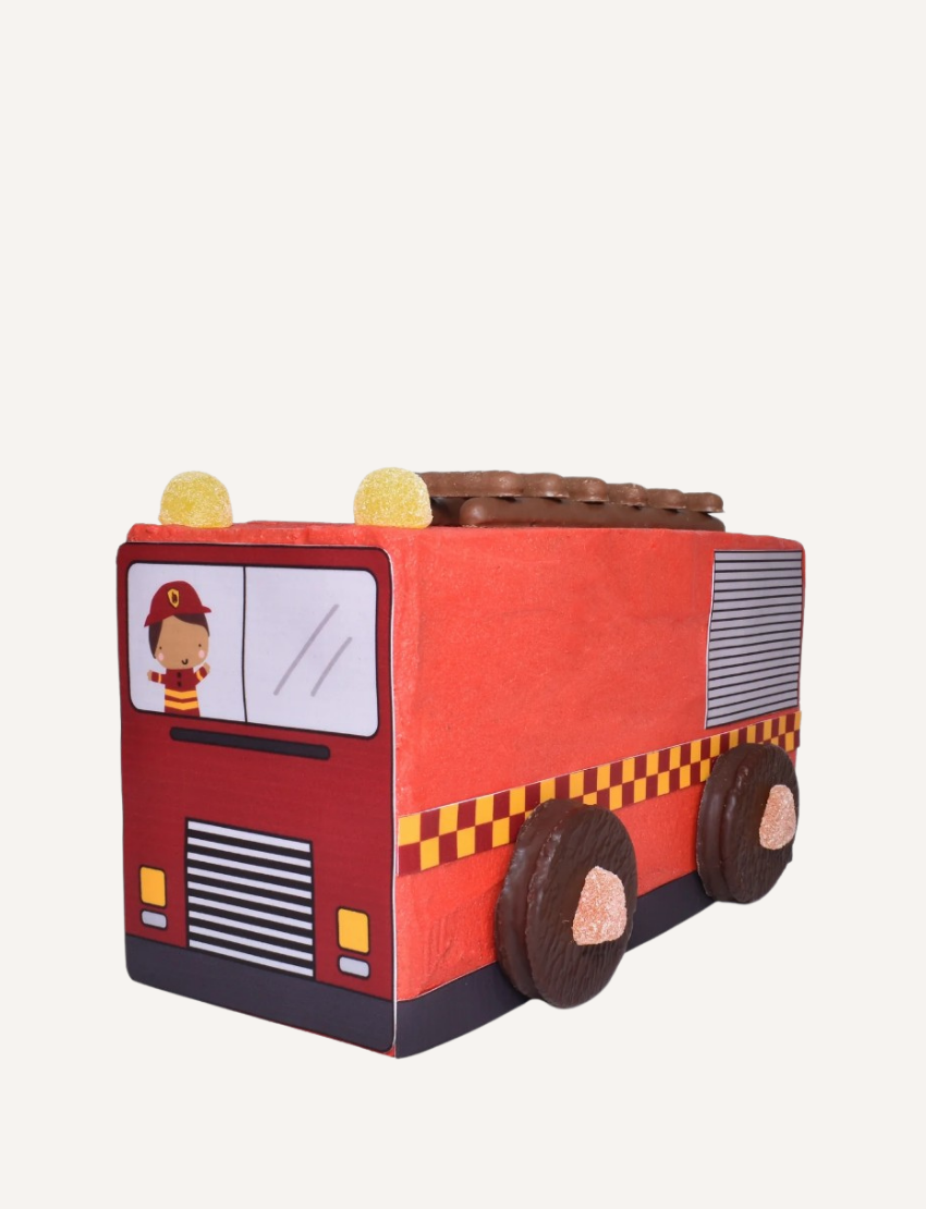 Green dinosaur cake decorating kit with candy eyes and gummy decorations.