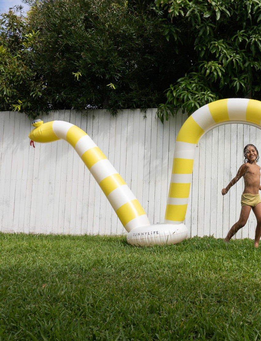 SunnyLife Snake Giant Sprinkler in Yellow: an inflatable arched snake toy for fun water play in the garden.