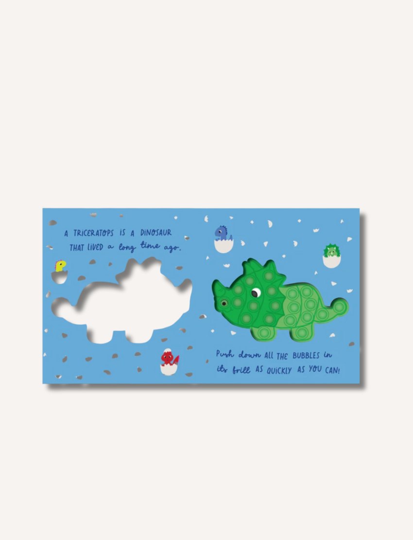Interactive pop-it dinosaur book featuring a triceratops with textured bubbles and a cutout.