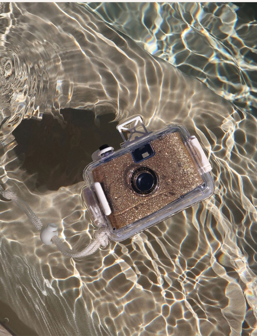 SunnyLife Glitter Gold Underwater Camera: a fun, durable, and easy-to-use camera for aquatic adventures.