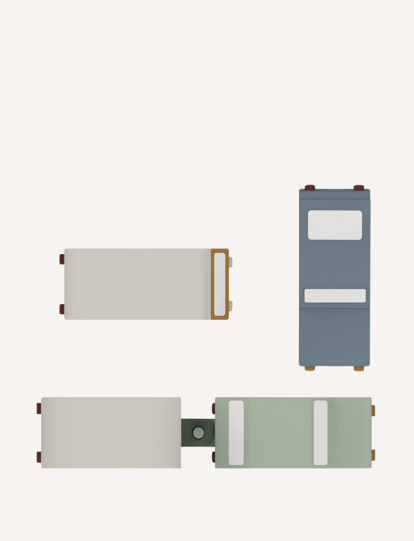 Top view of wooden toy vehicles: a caravan, a truck with a caravan, and two cars.