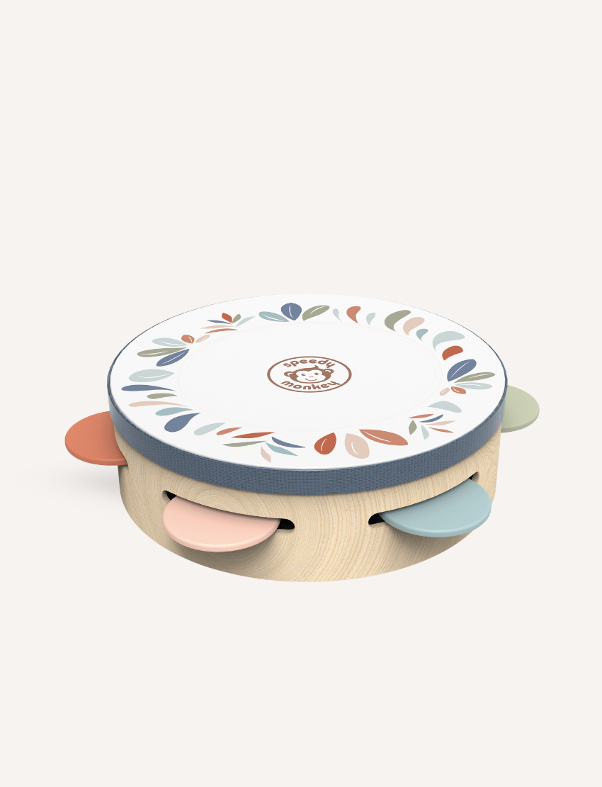 Speedy Monkey wooden tambourine with a colorful leaf pattern and pastel jingles.