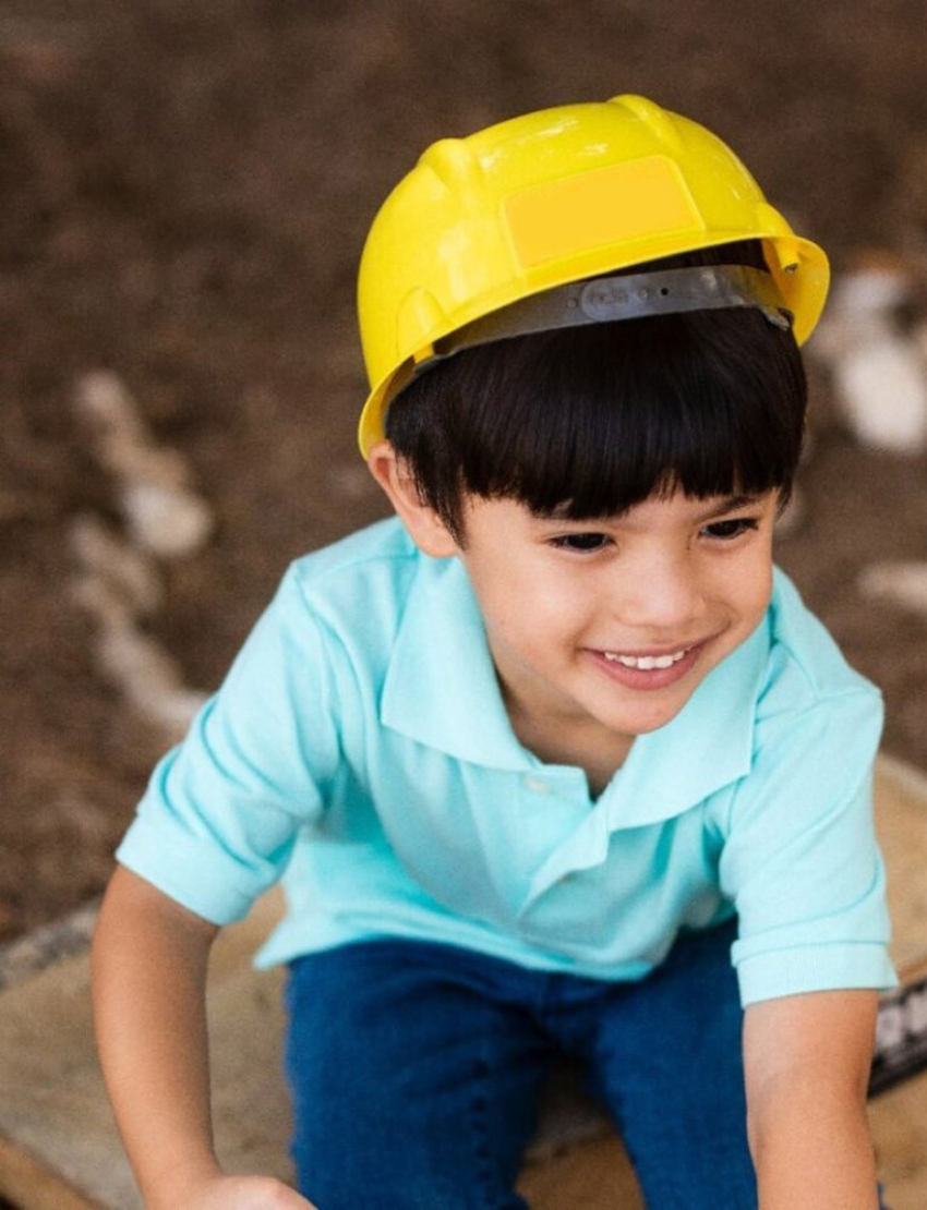 Bright yellow child-sized construction hard hat with a visor and adjustable strap for playtime safety.