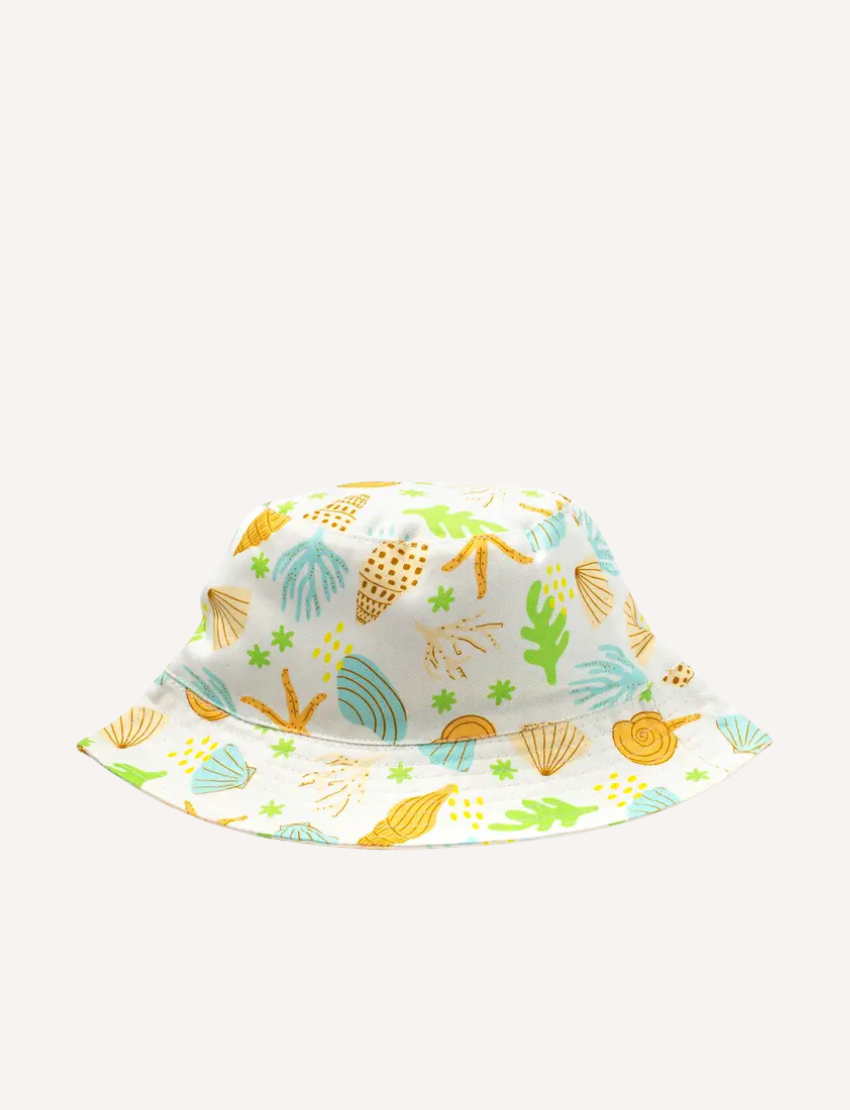 White bucket hat with a vibrant seashell and marine life print, perfect for kids' beach adventures and sun safety.