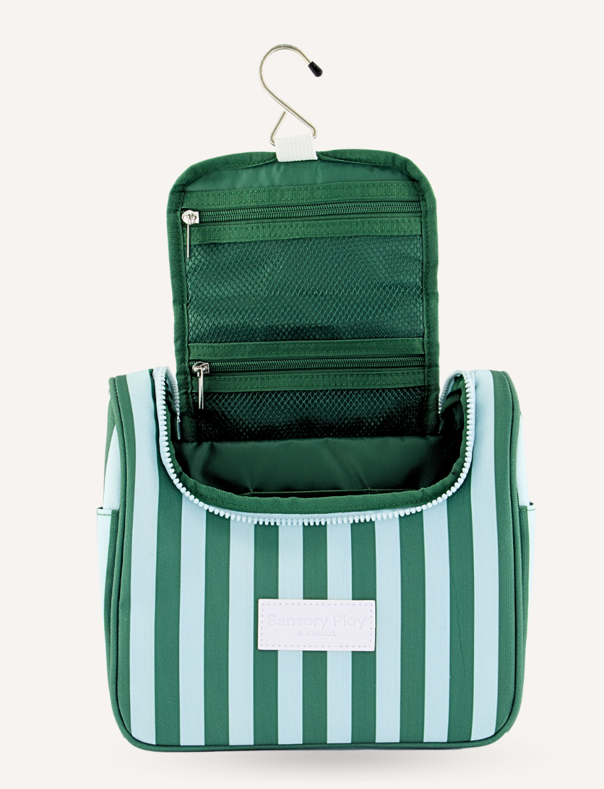 Green and light blue striped toiletry bag by Sensory Play Australia, designed for convenient organization of essentials while traveling or at home.
