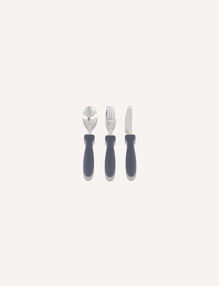 Collage of four kids cutlery sets in dark grey, pale blue, white, and green colors in packaging.
