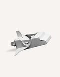 Cardboard space shuttle model for imaginative play, white with angled wings.