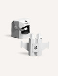 Cardboard robot head and small rocket ship models for imaginative play.