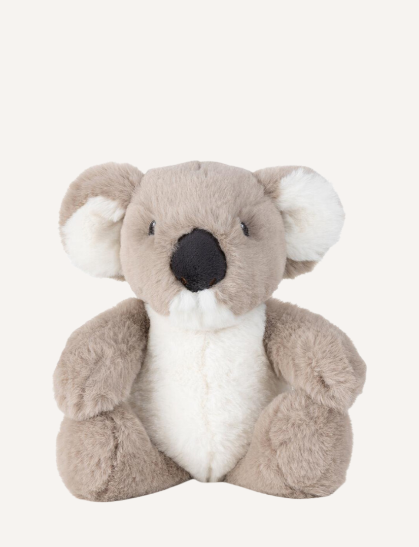 Plush koala with grey fur and white inner ears sitting on a white background.