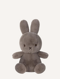 A fuzzy, grey Miffy plush toy with its signature X-shaped mouth, sitting on a white background.