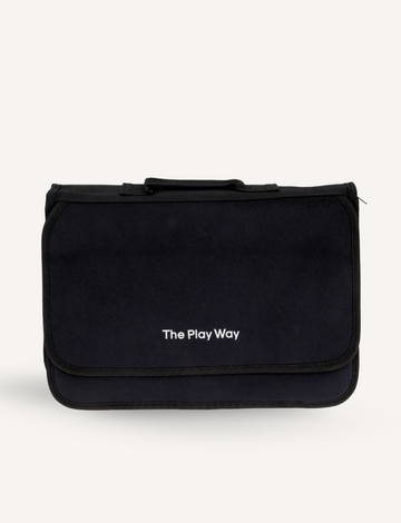 Introducing the Compendium by The Play Way: a sleek, black rectangular carrying case featuring a top handle and "The Play Way" elegantly printed in white on the front flap. Perfect as a handwriting companion, this bag keeps your writing tools organized and easily accessible against its pristine white background.