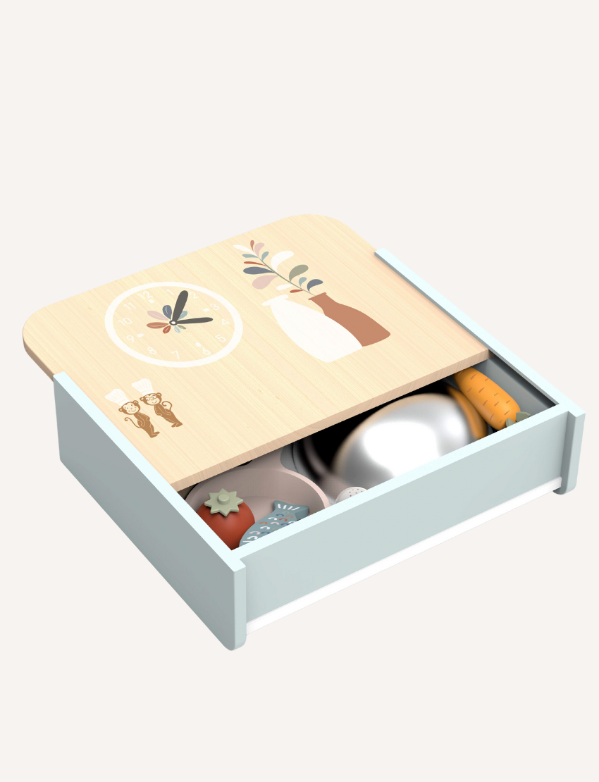 Open Speedy Monkey wooden table kitchen drawer revealing cookware and food items, neatly stored for organized play.