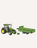 Green John Deere tractor with yellow wheels and a detachable green trailer.