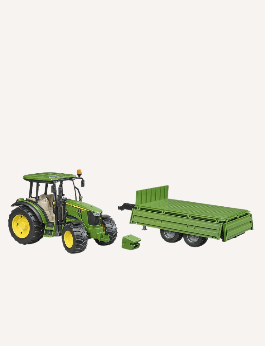 Green John Deere tractor with yellow wheels and a detachable green trailer.