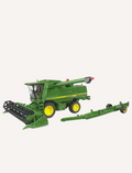 Green John Deere combine harvester with yellow wheels and a detachable header.