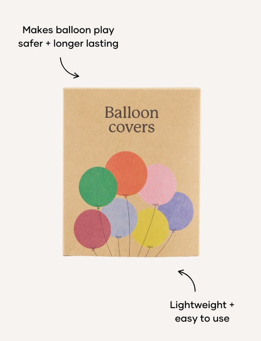 A set of colorful balloon covers by Sensory Play Australia, featuring an inflated beach ball, several deflated balloons in various colors, and a cardboard box labeled "Balloon Covers" with balloon illustrations.