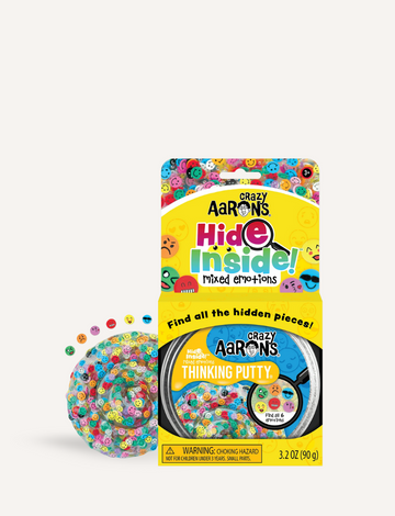 Crazy Aaron's Hide Inside! Mixed Emotions Thinking Putty packaging and a swirl of putty.