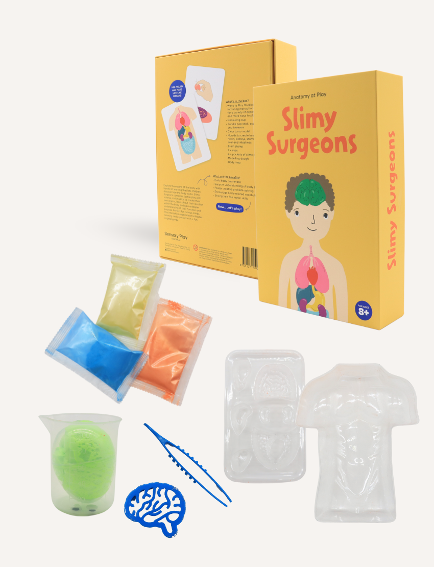 Unboxed Slimy Surgeons kit from Sensory Play Australia, showing powders, tools, & anatomical molds for hands-on learning.
