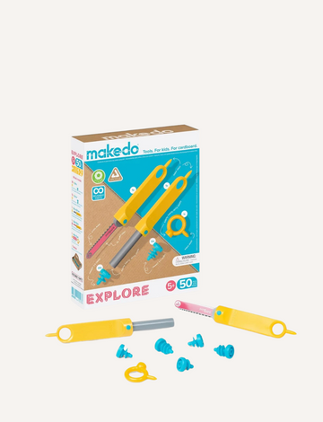 The makedo Explore Kit is a cardboard toolset for kids, featuring three yellow tools, screws, and parts. The packaging, which displays tool images, contains 50 pieces and is suitable for ages 5 and up.