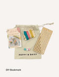 Poppy & Daisy DIY Bookmark kit with yarn, beads, wooden loom, and instructions.