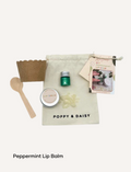 Poppy & Daisy Peppermint Lip Balm DIY kit with colorful glitter and instructions.