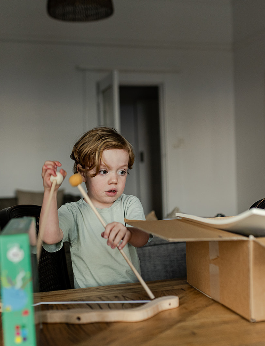 The Ollie & Jack Bow & Arrow Set is a classic wooden toy set for ages 5+, featuring a bow with a string and three soft-tipped arrows in white, yellow, and brown, ideal for developing strength during active play.