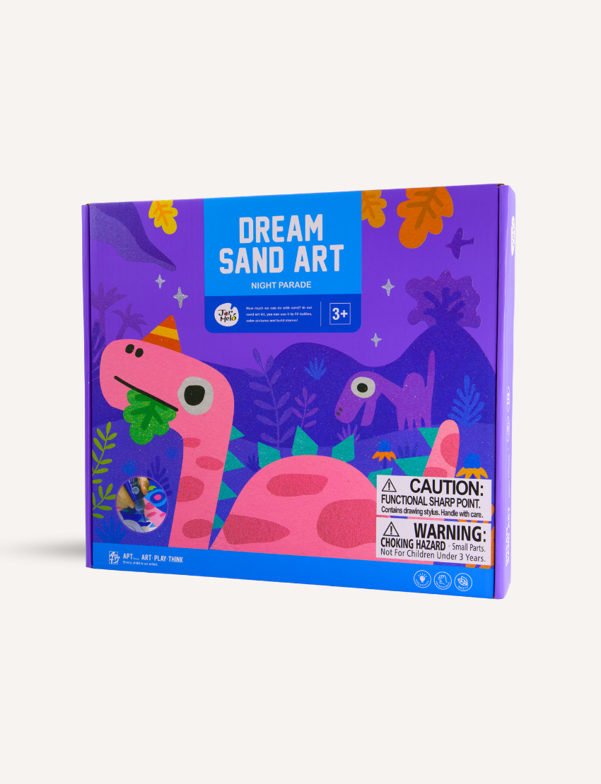 A colorful box titled "Sand Art - Night Parade" by Jar Melo, featuring a dinosaur-themed design. The box is predominantly purple and pink, displaying a friendly pink dinosaur and other prehistoric illustrations. It includes caution and warning labels for small parts and sharp points. Suitable for ages 3+.