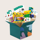An open blue and green box from Therapy At Home's Build it with Bricks Foundation Program includes two LEGO Classic sets and colorful activity cards—ideal for supporting executive function skills in therapy sessions—displayed on a plain light background.