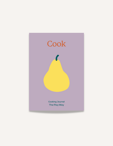 A notebook with a lavender cover featuring an illustration of a yellow pear at its center. The word "Cook" is written at the top in red, and "Cooking Journal: Culinary Adventures The Play Way" is written in blue at the bottom. This Cooking Journal by The Play Way brand is perfect for young chefs.