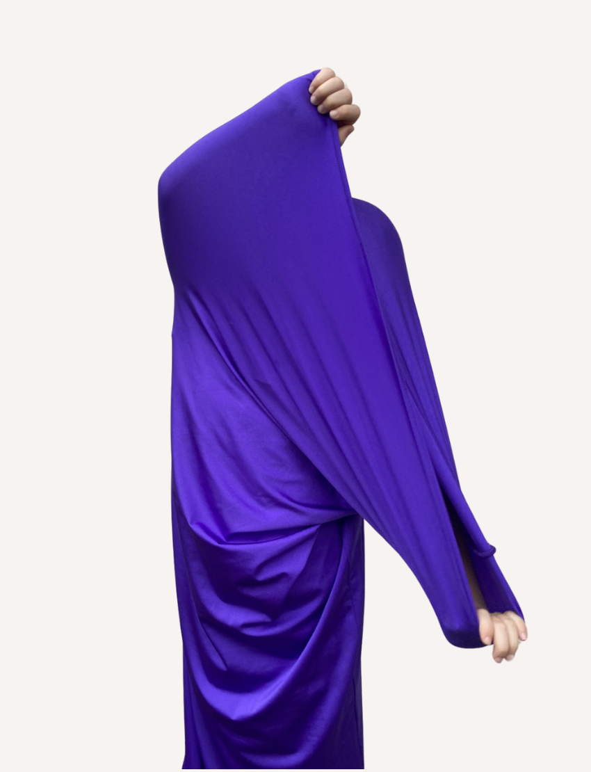 Person stretching The Play Way vibrant purple Movement Tube, offering calming deep pressure compression for sensory regulation, proprioception, and anxiety.
