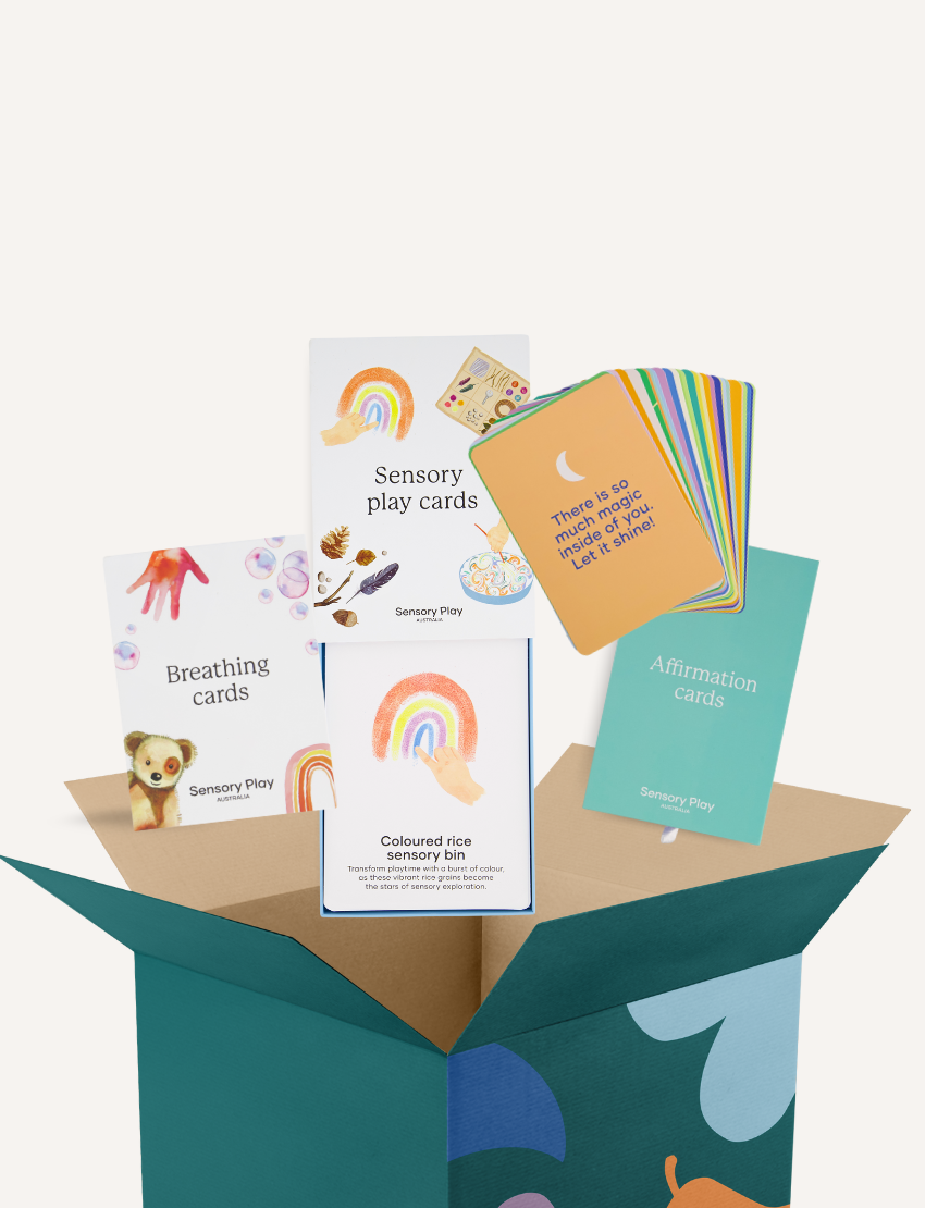 The Play Way Regulation Card Set Bundle, an open teal box revealing Sensory Play, Breathing, and Affirmation cards to help children with emotional and sensory regulation.