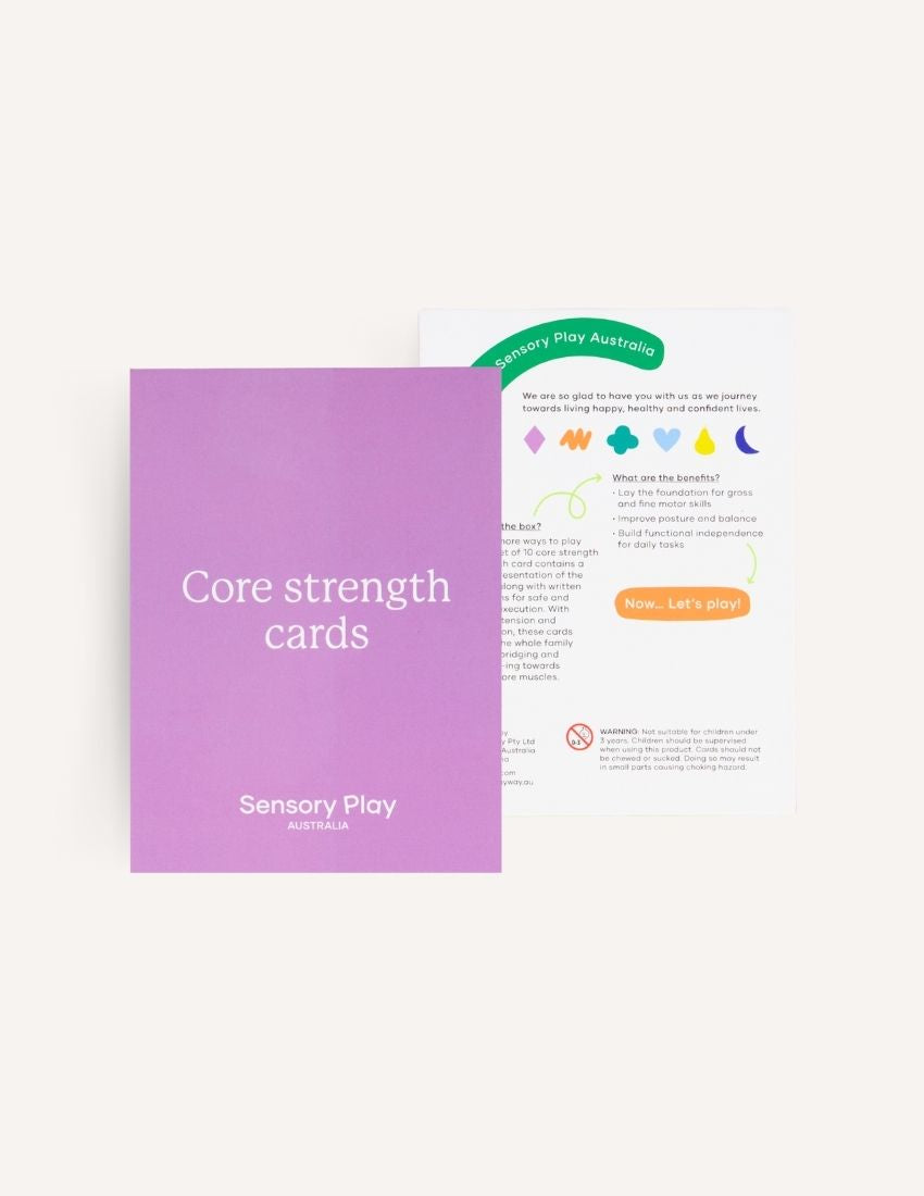 A green box is open, revealing a yellow scooter board, a silver exercise ball, and a set of purple and white "Inchworm" Core Strength Cards, all part of The Play Way's ultimate Core Strength Kit.