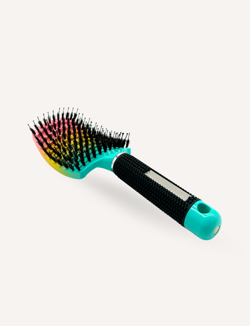 Introducing the Sensory Hair Brush - Rainbow from Sensory Play Australia, featuring a stunning gradient design that transitions beautifully from pink to turquoise. The sleek black handle includes a small label space, while its uniformly arranged bristles ensure an enjoyable hair care routine. Presented against a plain white background, this brush provides a delightful multi-sensory experience.