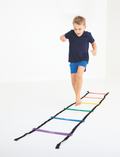 Seven Rainbow Ladders from Hart Sport are arranged in a fan shape, each featuring a different vibrant color: red, orange, yellow, green, blue, purple, and pink. These ladders include black straps at the ends.