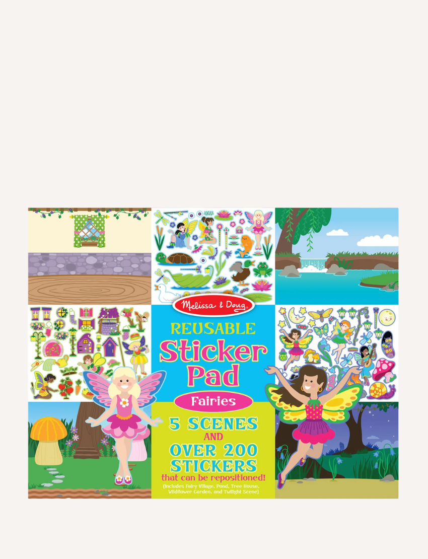 A child plays with a Melissa and Doug Reusable Sticker Pad - Fairies, which features a vibrant pond scene. The page includes stickers of a fairy, frog, duck, ducklings, swan, and various plants. The child is in the process of peeling off a duck sticker from the colorful and playful scene.