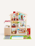 The Hape Doll Family Mansion is a charming wooden dollhouse with a red roof that features multiple rooms furnished with miniature furniture, perfect for imaginative play. Several doll figures are placed in various rooms, including the living room, bedroom, kitchen, and bathroom. Ideal for group play, it even has a garden area on the base.