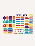 A box of the Connetix Tiles 212-Piece Magnetic Tile Mega Pack features red packaging adorned with images of vibrant geometric shapes creating a rainbow structure. The text states 