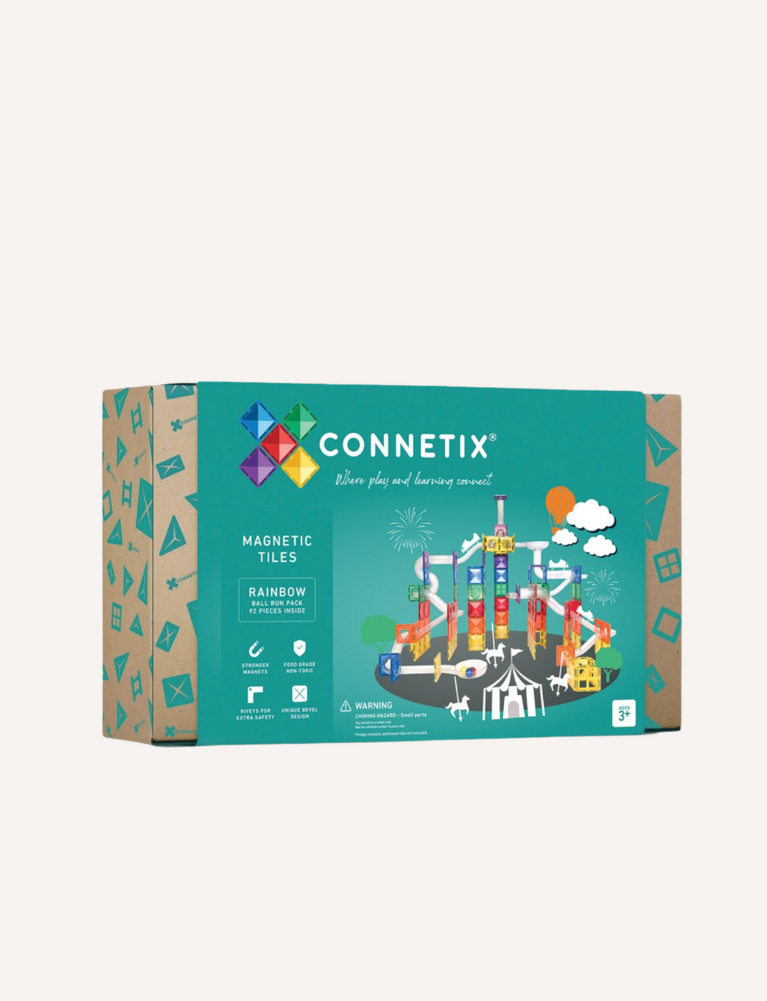 The image shows a box of Connectix 92-Piece Ball Run Pack by Connetix Tiles, ideal for STEM learning. The packaging is turquoise with geometric patterns, featuring an illustration of a colorful structure made from the tiles. The text reads "Connetix," "92-Piece Ball Run Pack," and includes product details and warnings.