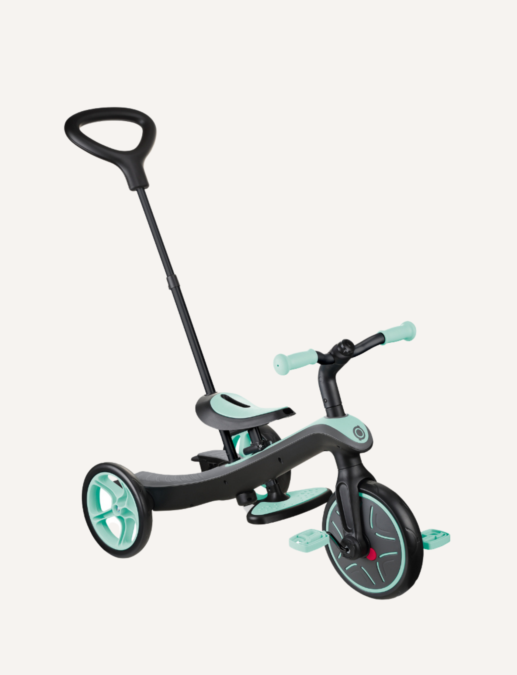 The Globber EXPLORER Trike 4-in-1 in mint features a rear handle for steering, a bucket seat with a safety bar, footrests, and a sun canopy. The tricycle has green accents and an adjustable saddle, making it perfect for young children to enjoy safe rides.