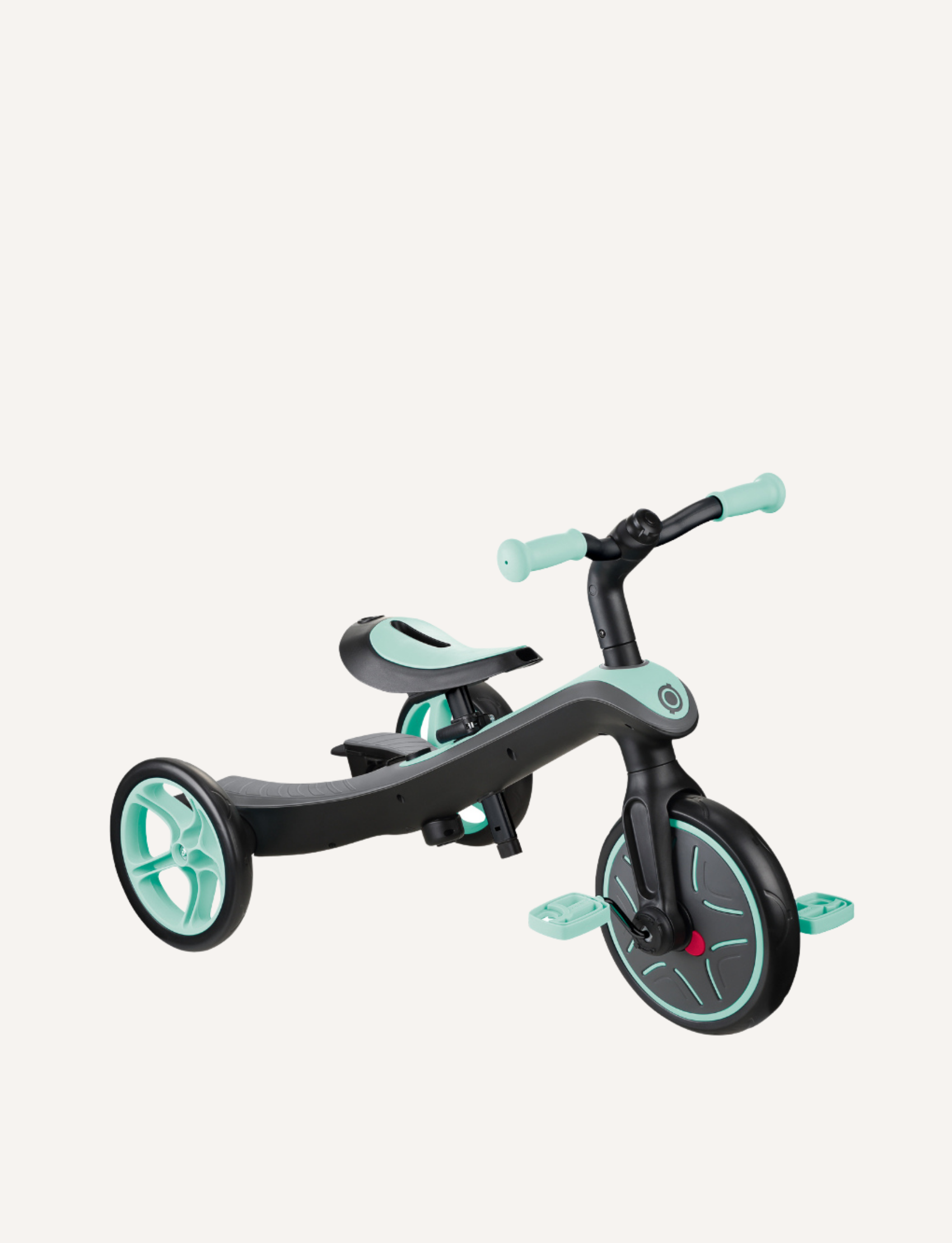 The Globber EXPLORER Trike 4-in-1 in mint features a rear handle for steering, a bucket seat with a safety bar, footrests, and a sun canopy. The tricycle has green accents and an adjustable saddle, making it perfect for young children to enjoy safe rides.