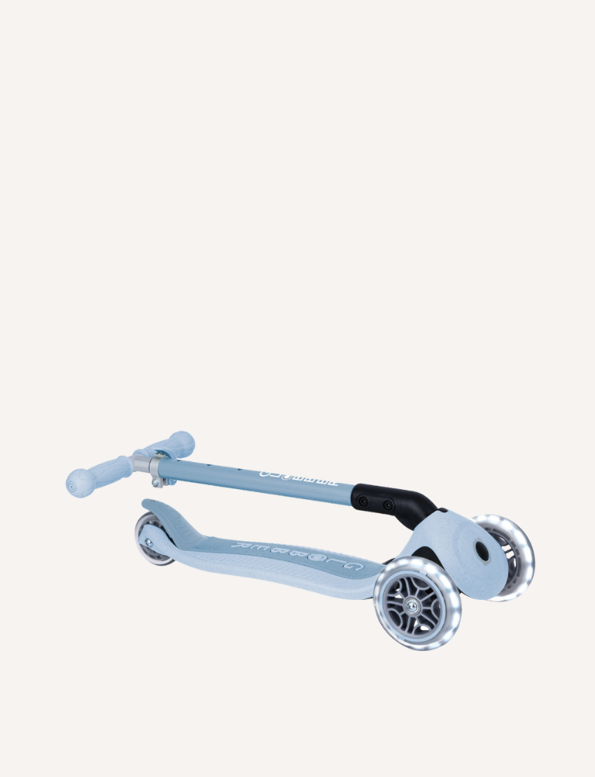 Front view of a blue Ecologic Primo Foldable Scooter with Lights by Globber, featuring three vertical handlebars, two front wheels, and one rear wheel. The scooter has an adjustable handlebar height and "GLOBBER" written on the central stem. The wheels and foot deck are light blue in color.