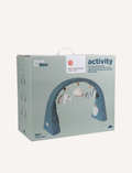 The Done by Deer Activity Gym is a blue arch with attached plush toys, perfect for floor time. The hanging toys include an elephant, a dome-shaped toy with geometric patterns, and a striped animal. Ideal for stimulating your baby’s senses, the arch stands freely with wide triangular supports at both ends.